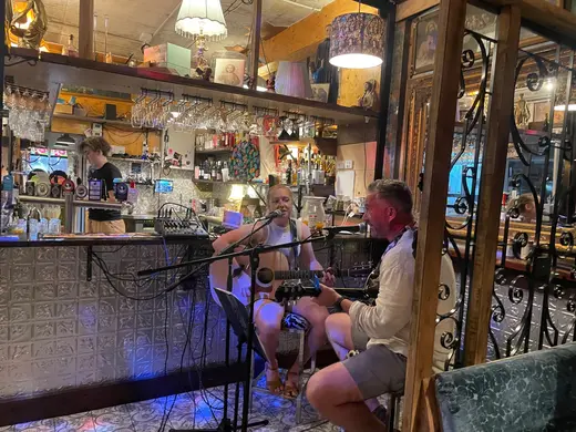 An acoustic set beside the bar